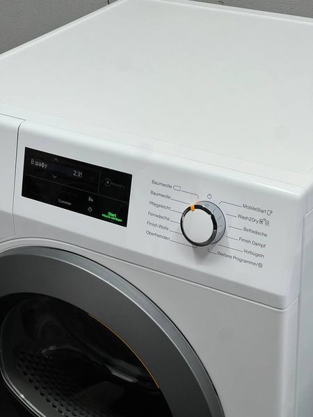 Комплект Mi. Пральна машина WCI 870 Wps  Та сушильна TCL 690 Wp 125 gala Edition pk0034 фото